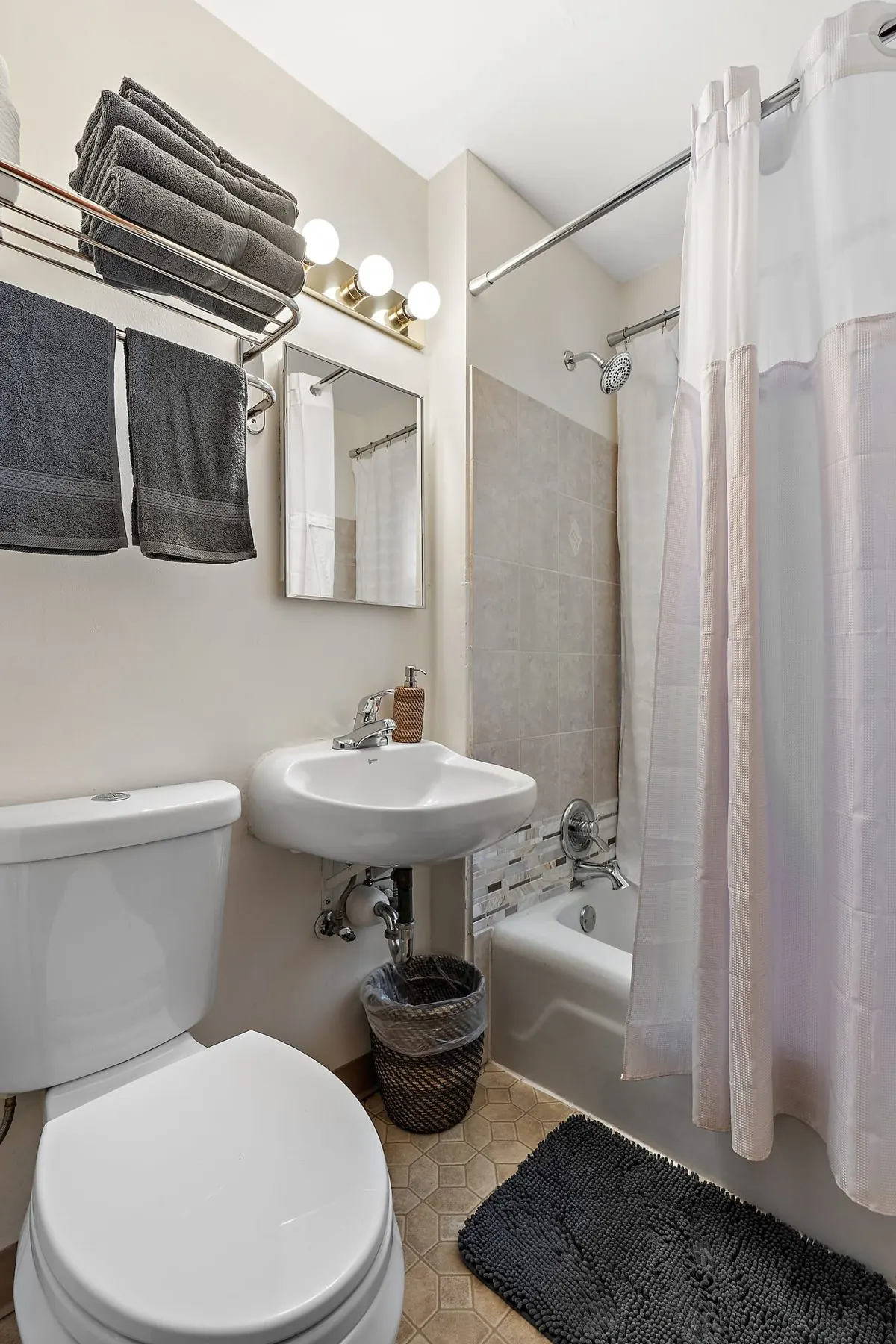 Bathroom with tub and shower
