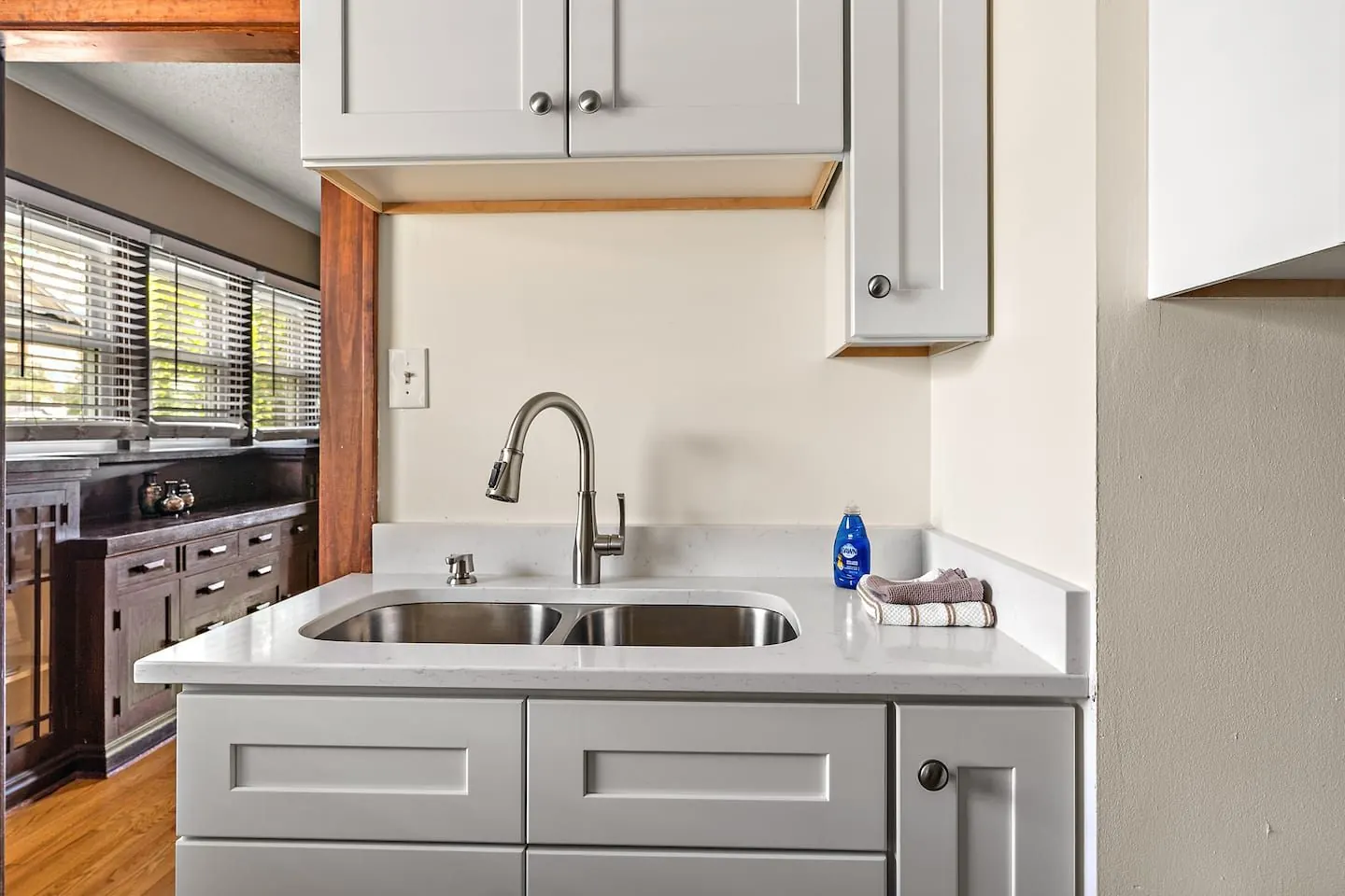 Full kitchen with stainless appliances and quartz counters