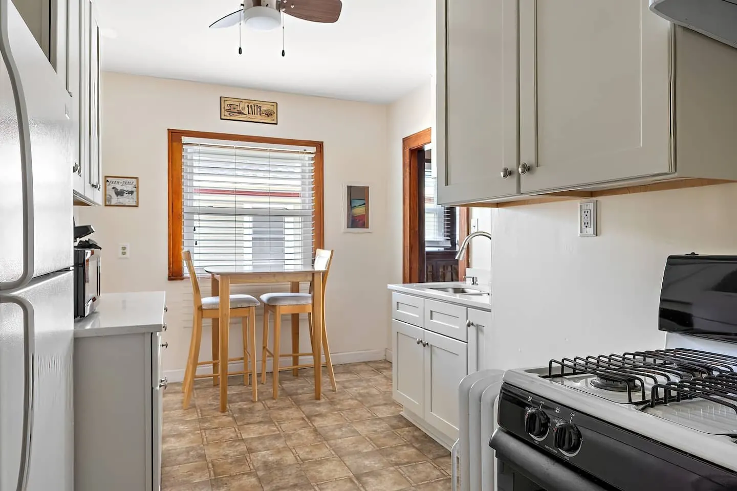 Kitchen with a small breakfast table by the window